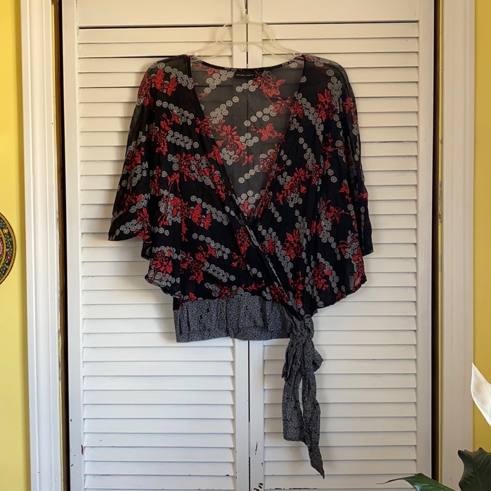 Deep V sheer floral batwing side tie top